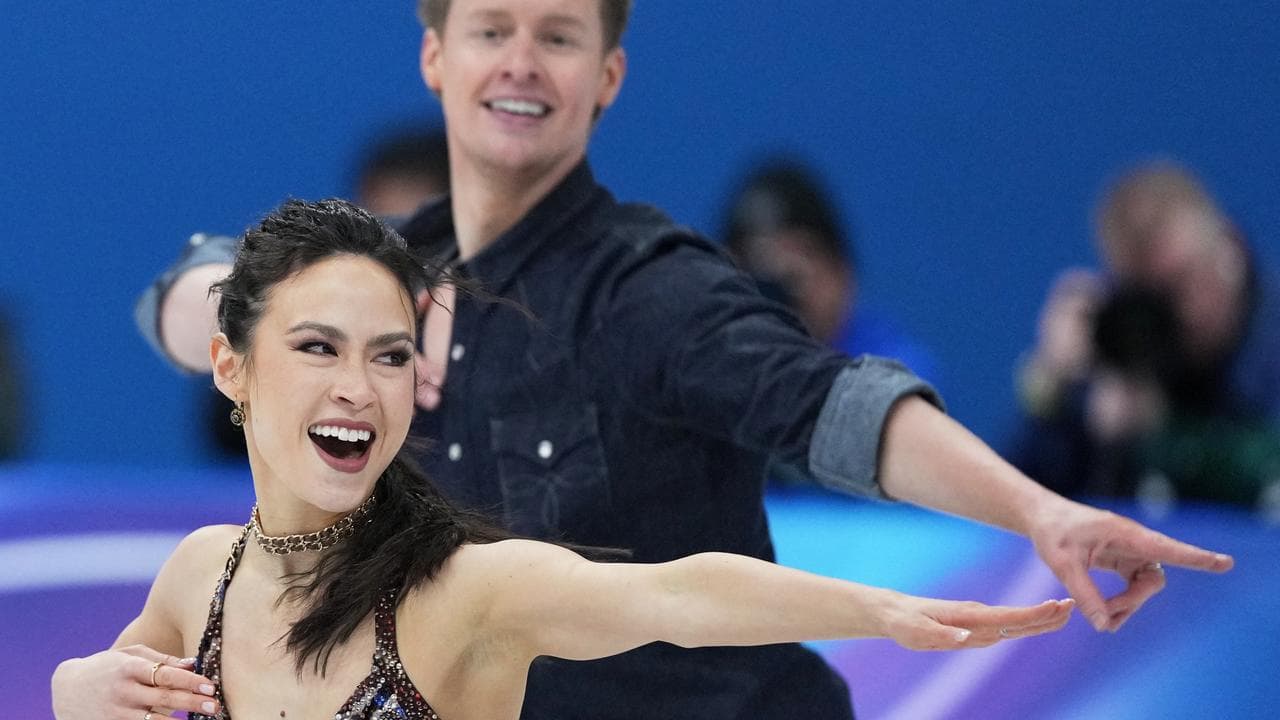 Ice-cool US skaters find their rhythm to rock judges