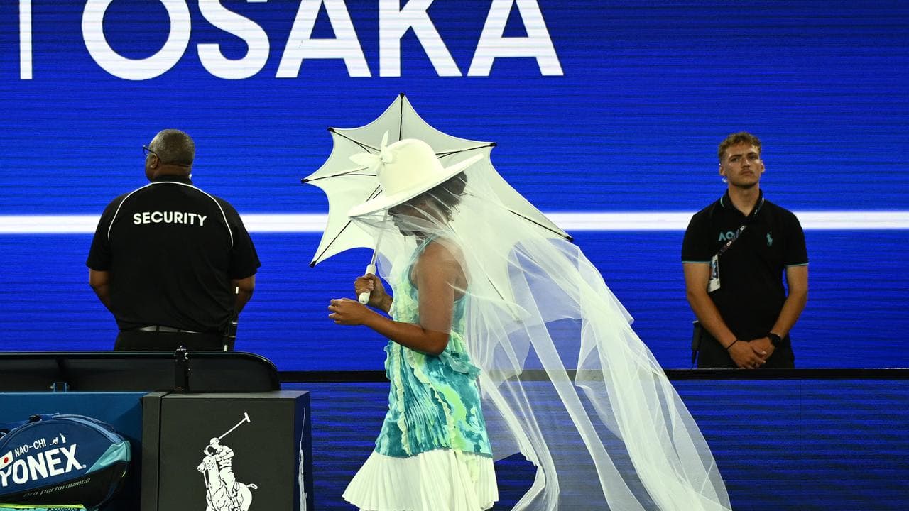Osaka serves up iconic look in entrance to Australian Open