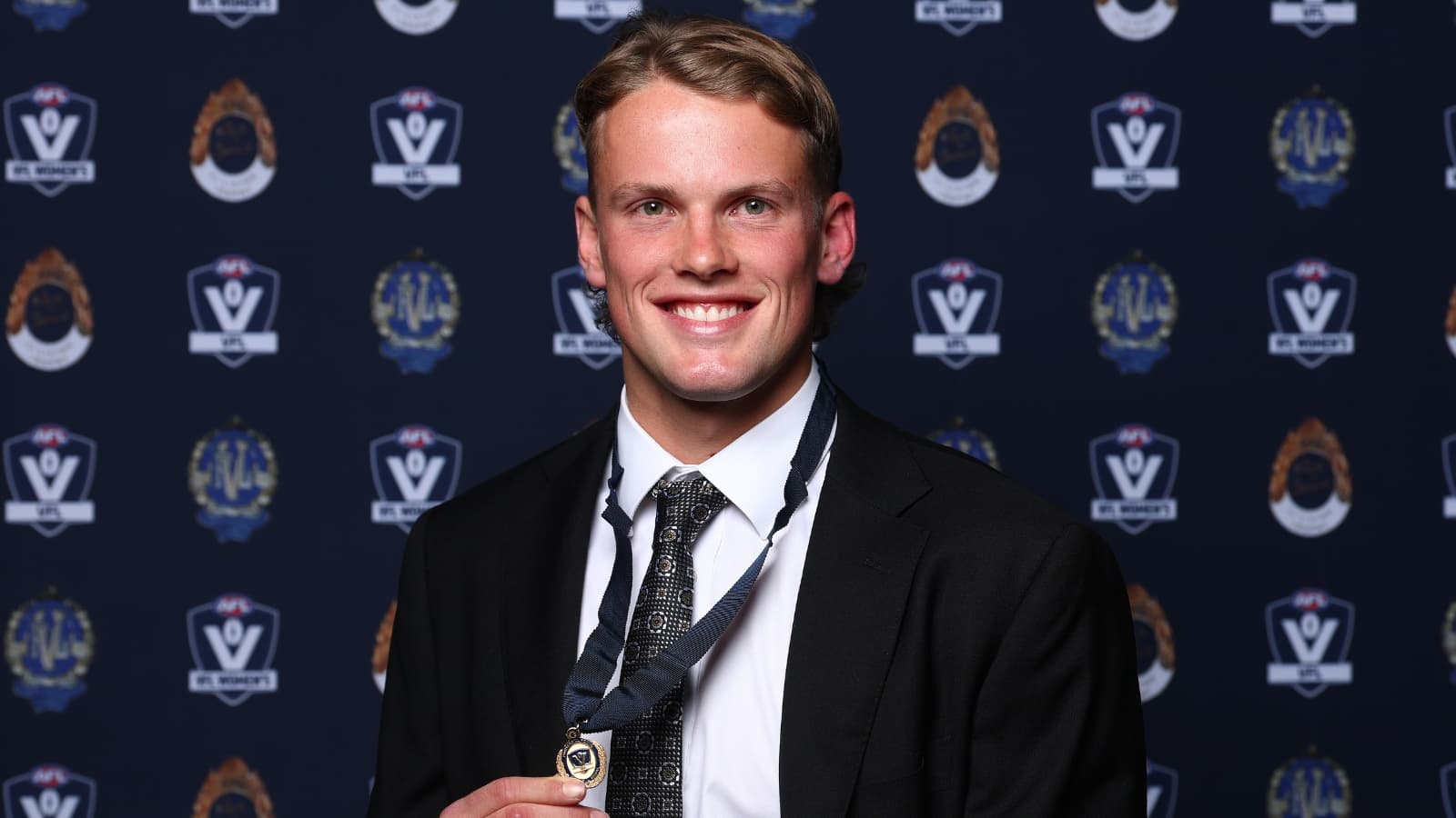 Collingwood staffer earns North Melbourne SSP spot