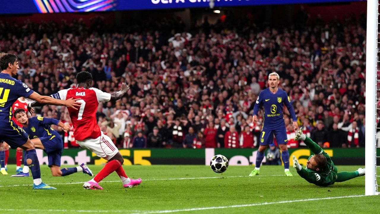 Saka seals Arsenal's place in Champions League decider