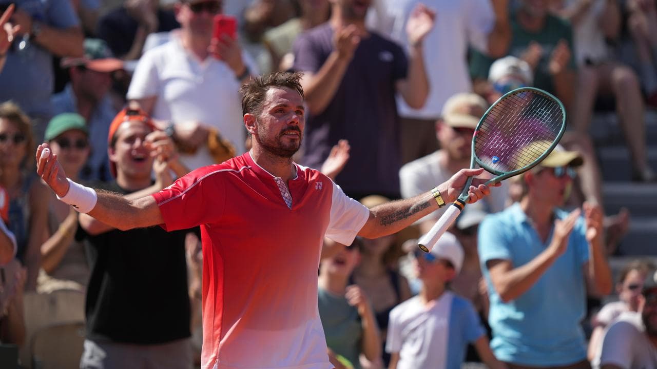 Emotional Wawrinka waves fond goodbye to French Open
