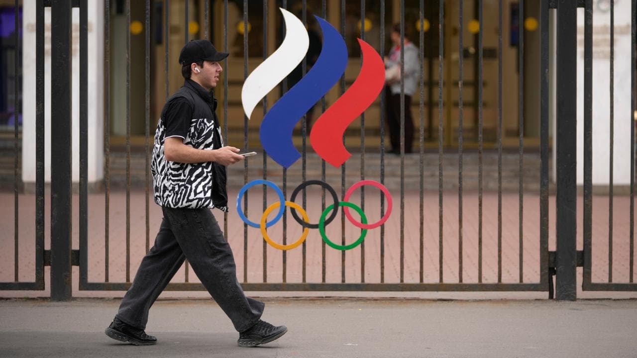 IOC lifts ban on Russian athletes, but not yet on flag