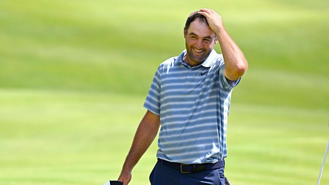 Scheffler storms to lead, misses out on sub-60 round