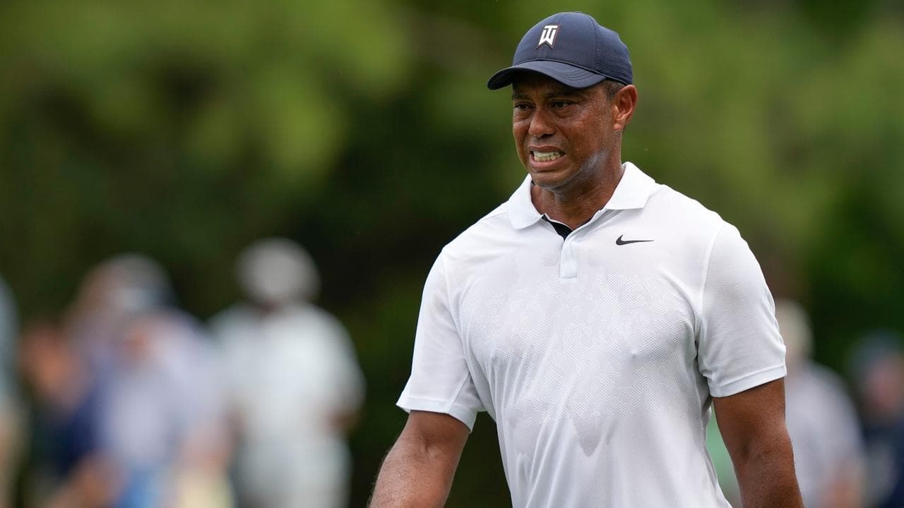 Down but not out: Tiger has seventh back surgery